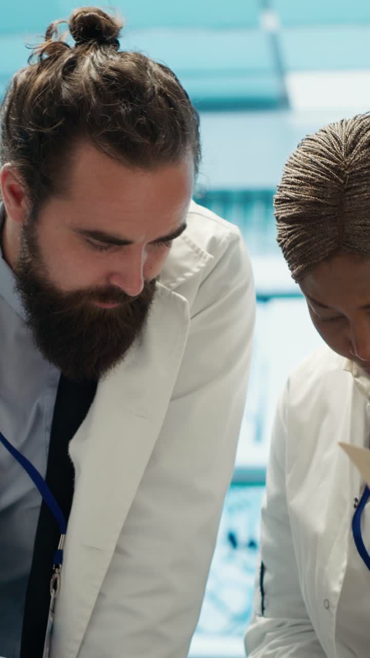 Vertical Video Healthcare team examines test results for potential dangerous diagnosis