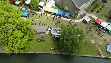 people in dogwood festival event in siloam springs, arkansas, usa - aerial drone shot