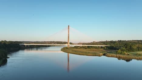 summer evening view of the thomas francis meagher bridge with swallows feeding waterford ireland