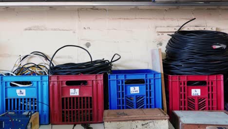 electrical cables in crates - pan shot