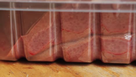 raw liver in plastic packaging