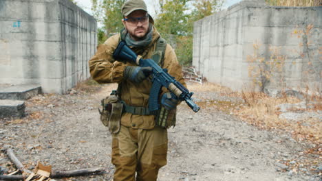 a man plays airsoft with a pistol in his hand 7