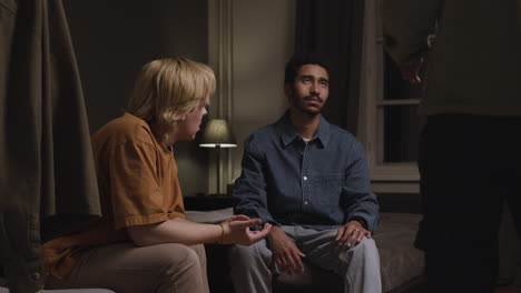 meeting of male friends in an apartment