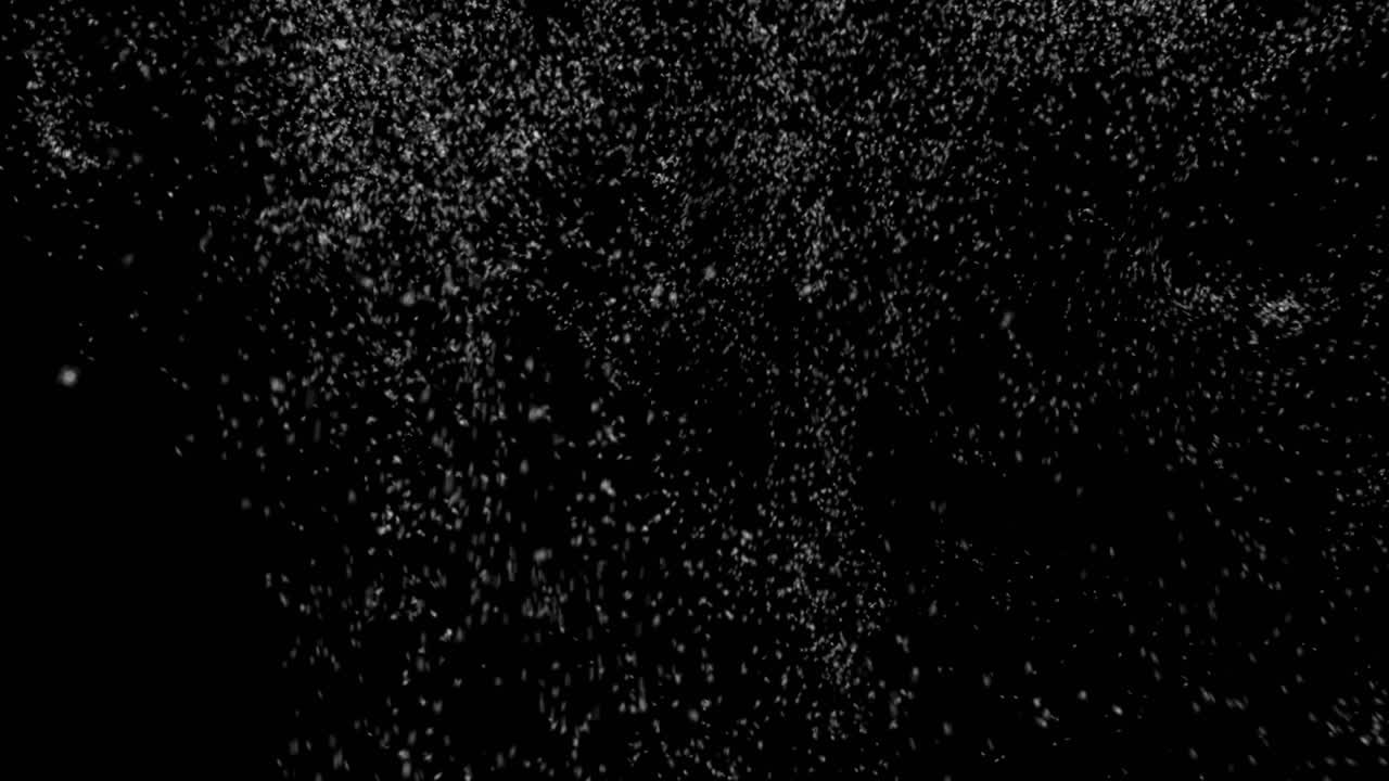 Particelle di neve che cadono