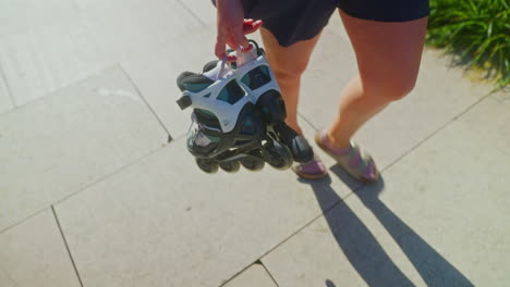 woman walking with roller skates