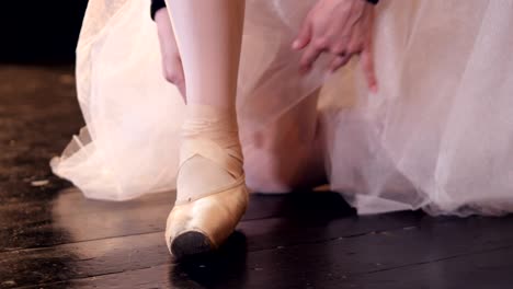 dancer putting on her shoes