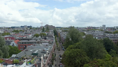 Beautiful-view-over-Amsterdam,-Netherlands-Neighbourhood-and-tilt-down-on-Street