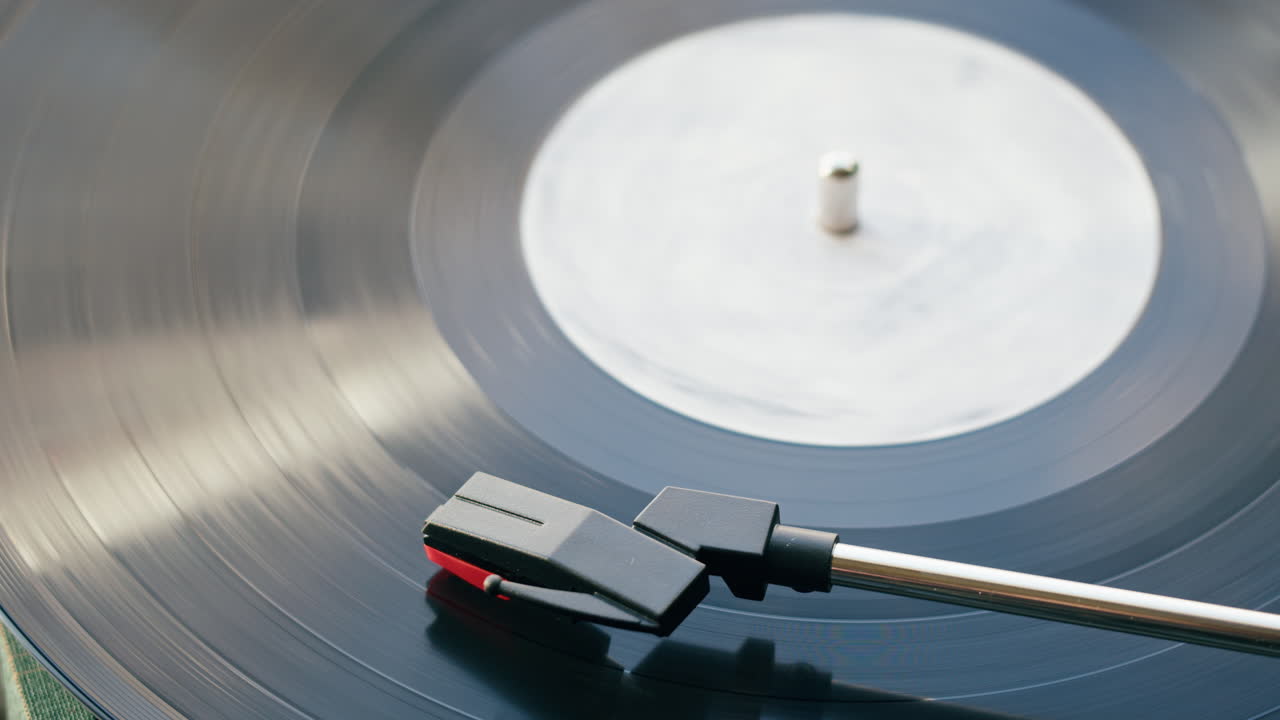 Close Up of Vinyl Record Spinning on a Turntable