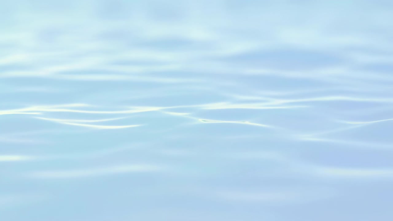 ゆっくりと穏やかに動くさざ波のある青い水面