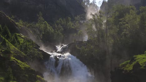 latefossen waterfall odda norway. latefoss is a powerful, twin waterfall.