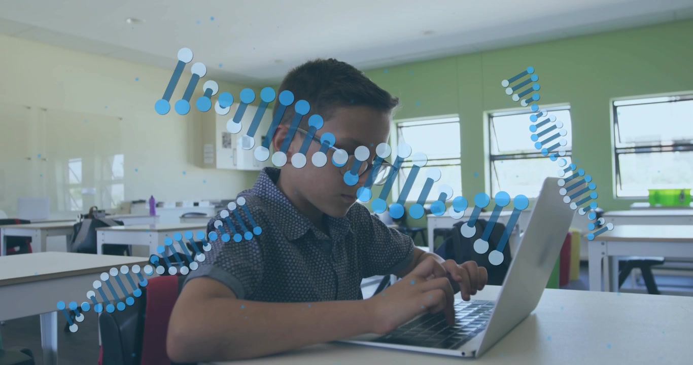Schoolboy typing on laptop initiating spiraling blue DNA helix graphics showing science education