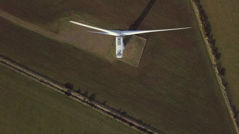 aerial footage of the a wind turbine farm in scotland