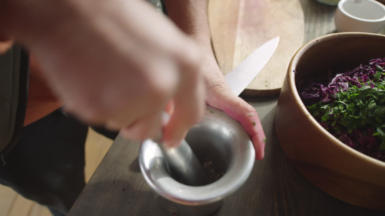 Crushing Sea Salt with Mortar and Pestle