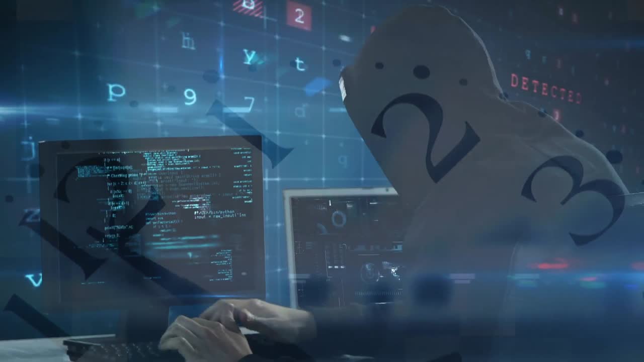 어두운 방에서 컴퓨터를 사용하는 해커