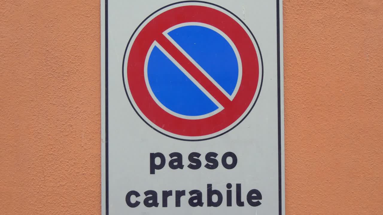Italian Traffic Sign "Passo Carrabile" On The Wall