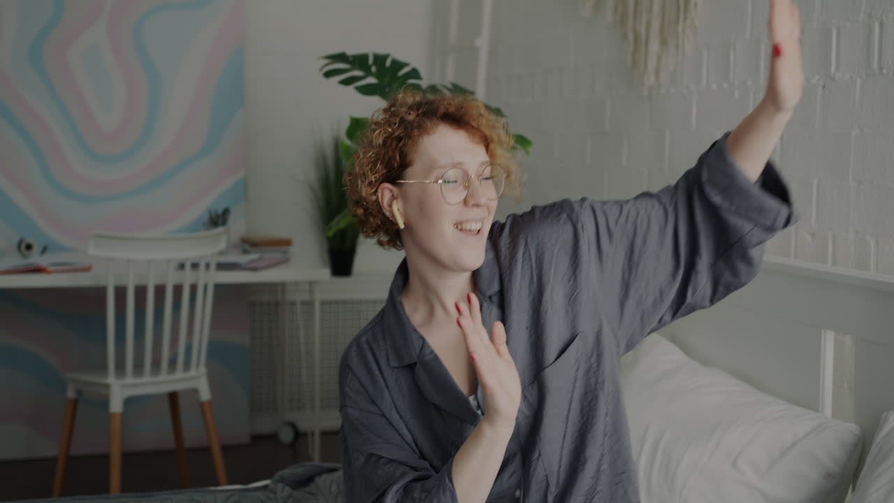 Woman Dancing in Her Bedroom