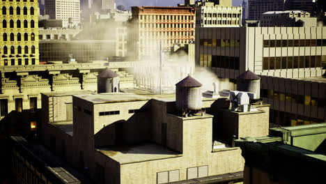 city rooftops with water towers and urban skyline during daylight hours