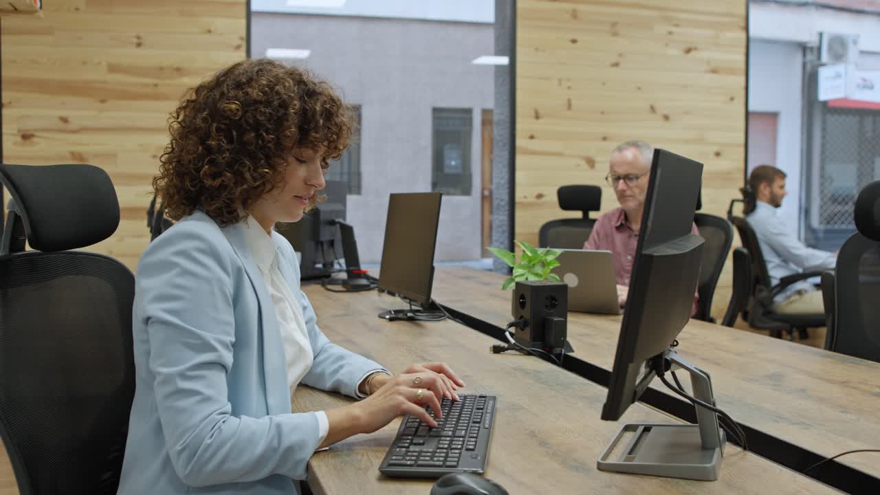 Business woman working on computer in office