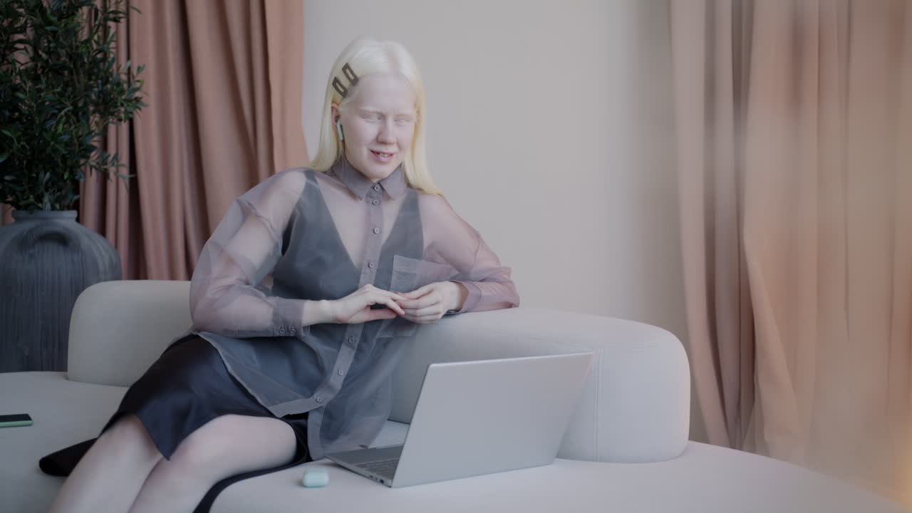 Woman having a video call on a laptop