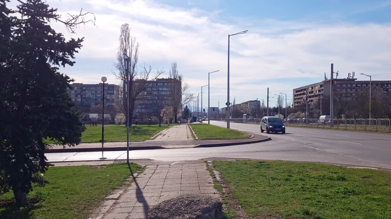 Walk on the sidewalk next to 'Hristo Botev' Boulevard in Sofia, Bulgaria