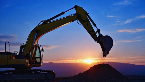 excavator at sunset
