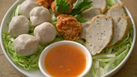 boiled fish balls, shrimp balls and chinese fish sausage with spicy dipping sauce