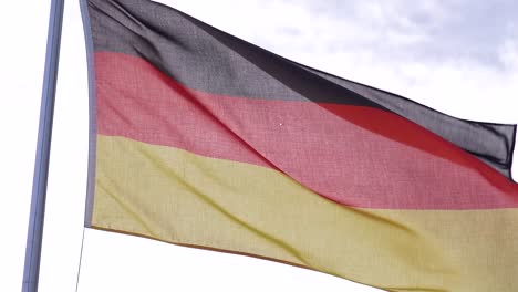 german flag fluttering gracefully in the breeze