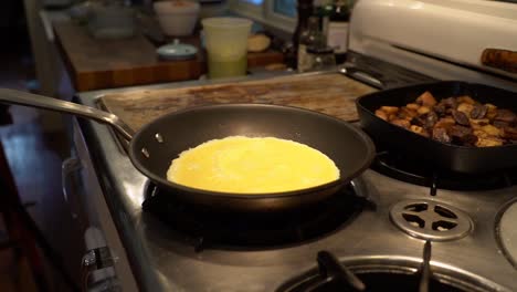 eggs are cooked in a skillet