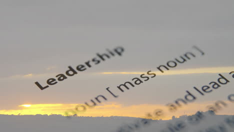 Animated-leadership-definition-over-sunset-landscape