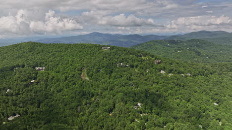 highlands north carolina aerial v17 drone flyover hillside neighborhood capturing lush green forests, mountainous nature landscape and town center during summer - shot with mavic 3 cine - july 2022