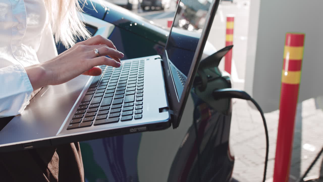 Closeup shot person typing on the computer keyboard working writing emails using internet female