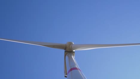 detail of rotating windmill turbine - from bottom