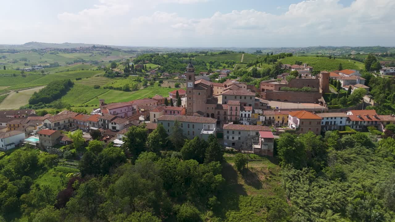 Castelnuovo Calcea, Monferrato region, Asti, Piedmont, Italy. 4k aerial view of the city. Langhe-Roero and Monferrato. Circling 360 above the city with the church Santo Stefano Martire.