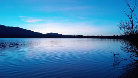 staffelsee lake in germany bavaria recorded in the afternoon twilight flying over the lake with a dji drone in 4k with nd filters