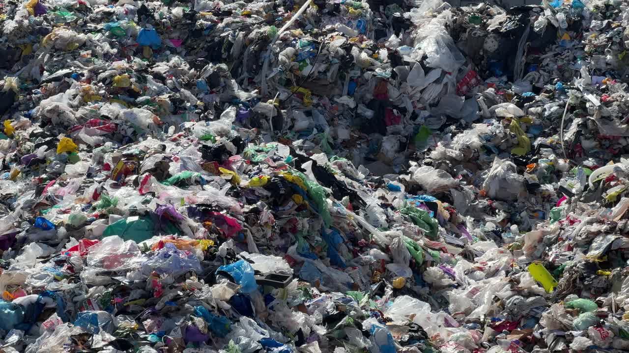 Pile of excess plastic trash from unsustainable overconsumerism