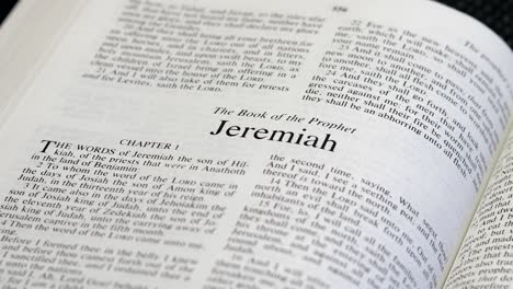 close up shot of bible page turning to the book of jeremiah