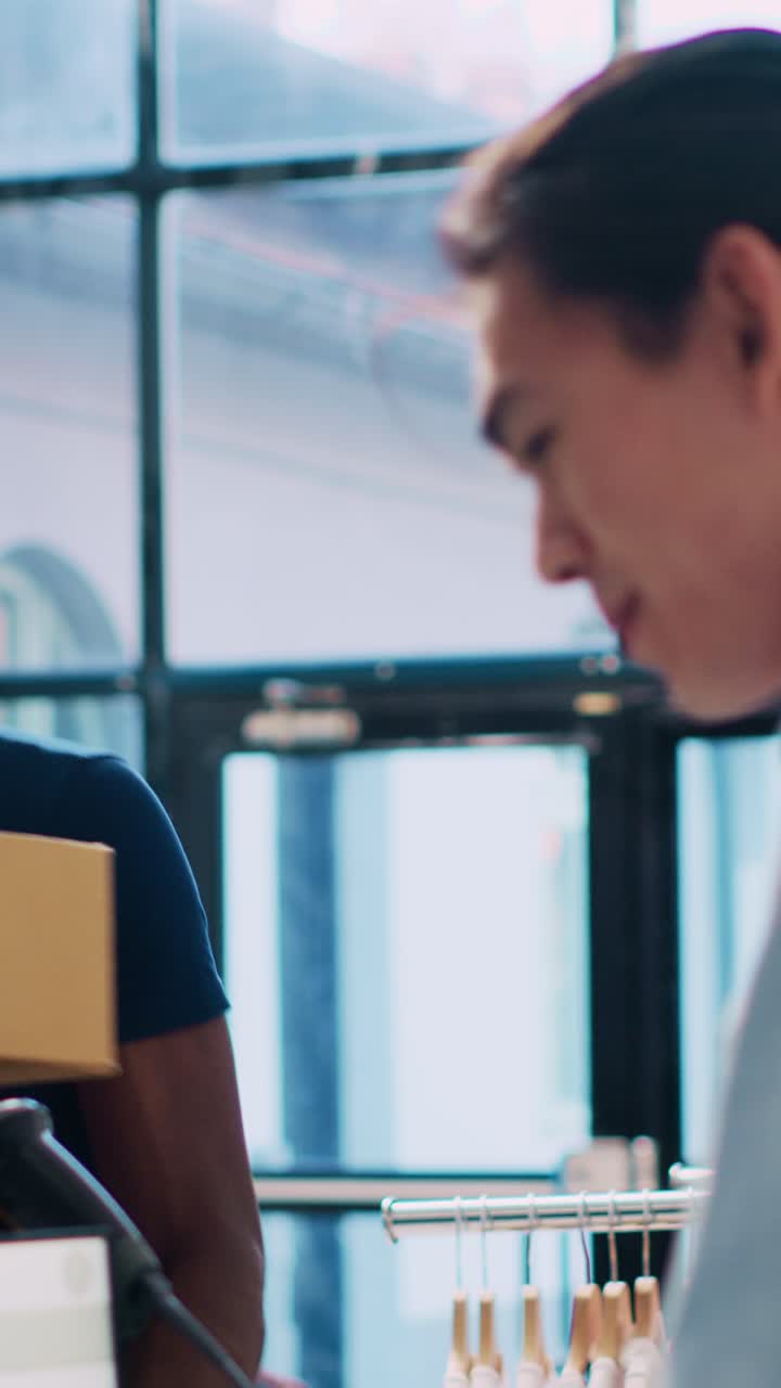 Delivery man getting signature on clipboard