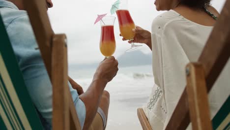 couple enjoying free time by the sea