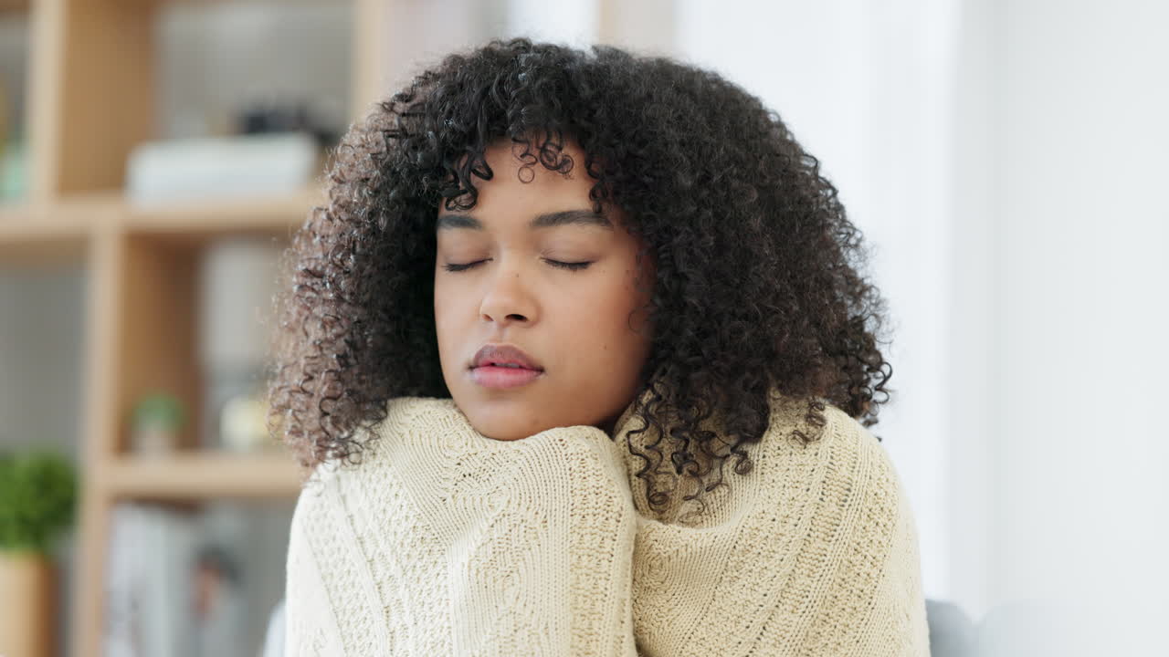 Sick, ill and coughing young unwell woman using