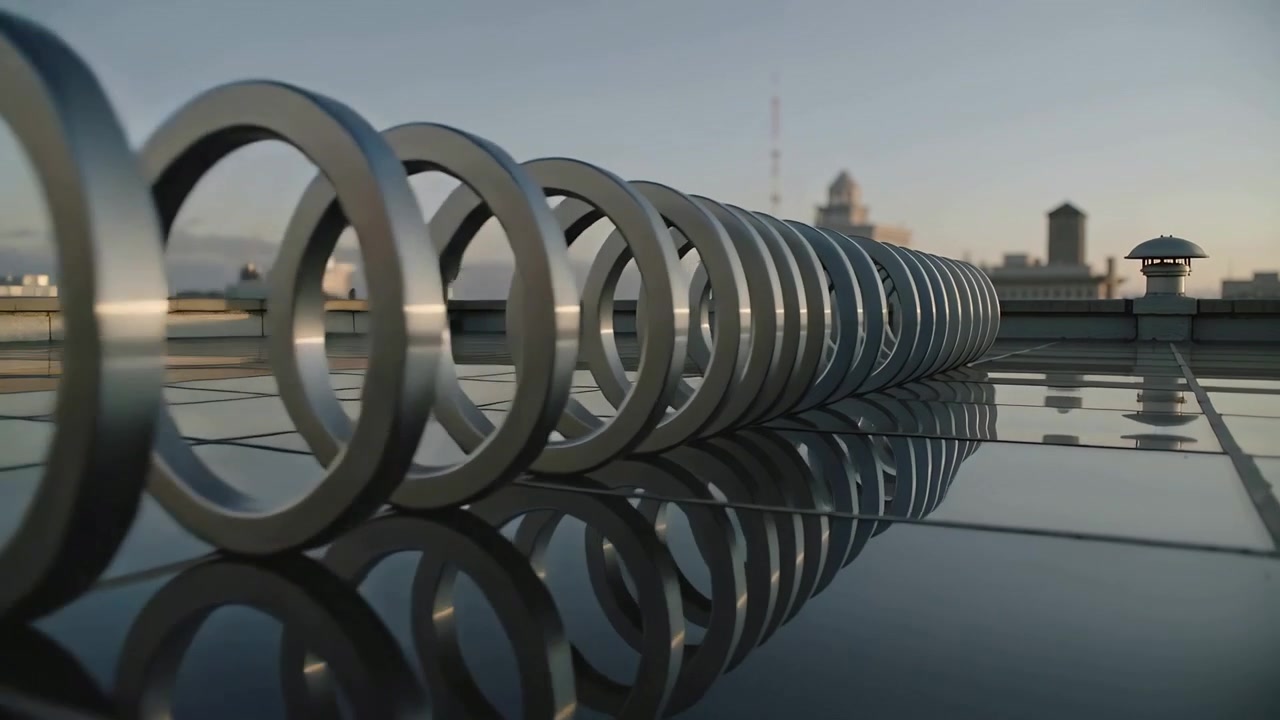 Metal Spiral Sculpture on Rooftop at Sunset