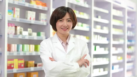 smiling female pharmacist in a drugstore