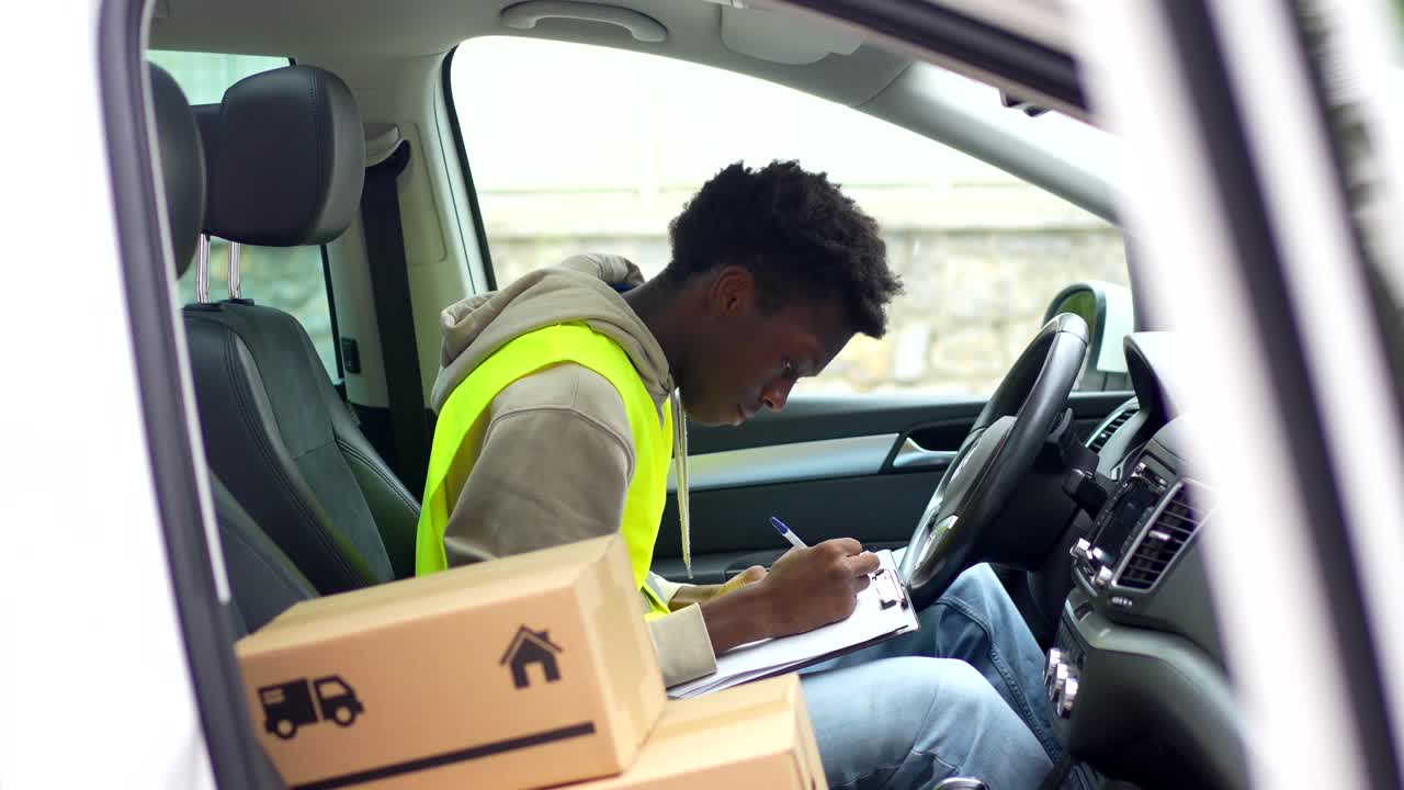 Delivery Driver in Car with Packages