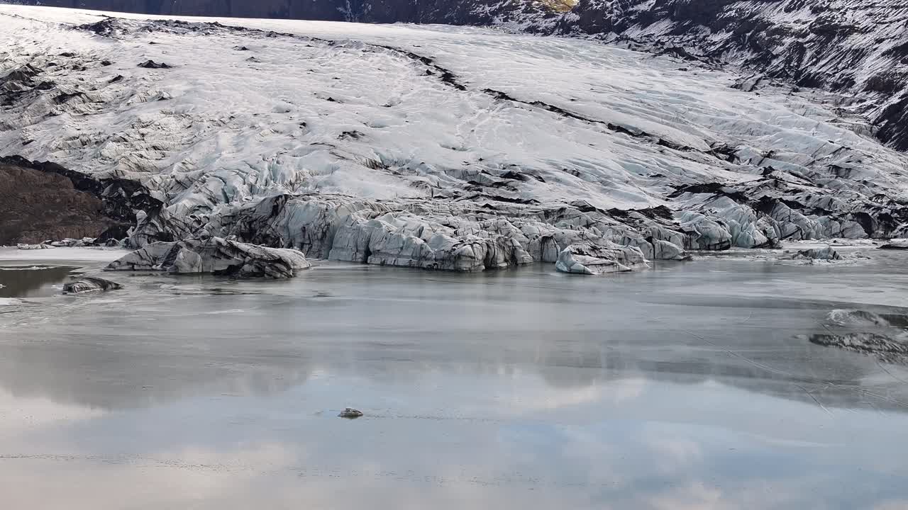 frozen glacier lake aerial Sólheimajökull Mýrdalsjökull Gletscher Iceland