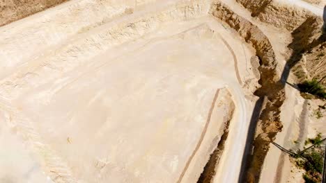 open pit mine industry on a sunny summer day - aerial shot