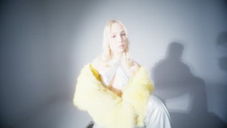 woman in a yellow fur coat