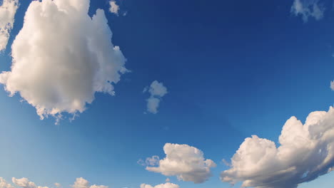 blue sky with white clouds on a sunny day (fisheye view)