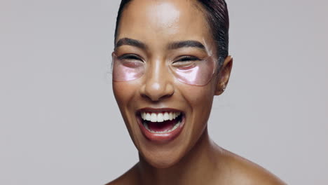 woman with eye patches