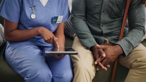 nurse consulting patient with tablet