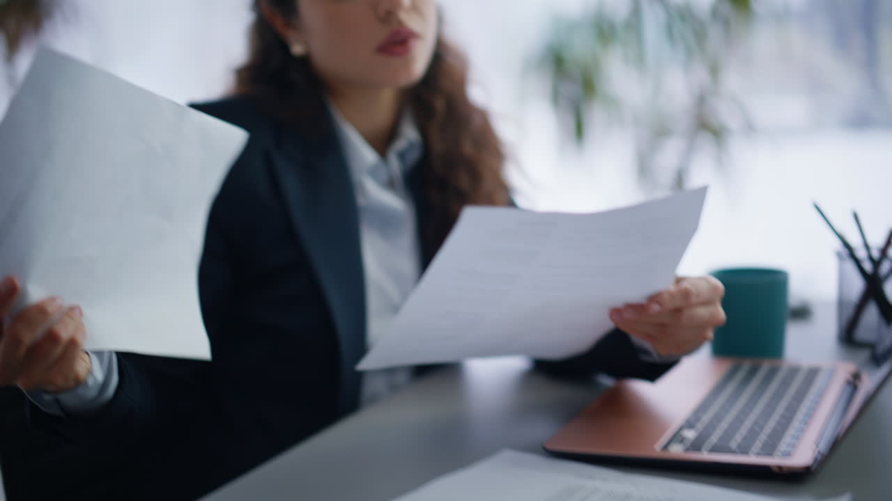 Closeup businesswoman working office. Nervous accountant finding work mistake