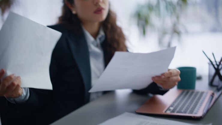 Closeup businesswoman working office. Nervous accountant finding work mistake